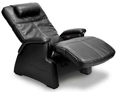Black massage chair in a reclined position