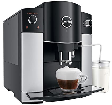 Jura Coffee Maker D6 Aroma with Milk frothing system attached and a cup of cappuccino