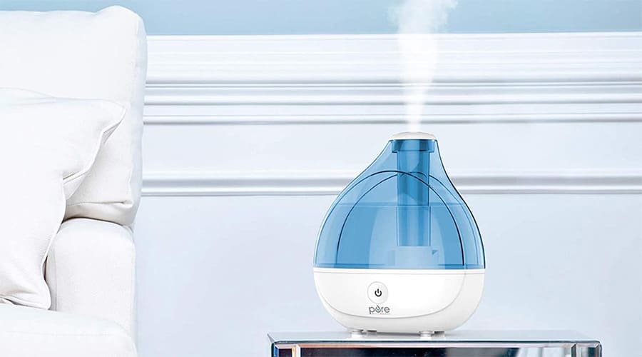 Humidifier vs Dehumidifier for Allergies: Pure humidifier on a side table