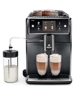 The Saeco Xelsis SM7684 with a full bean hopper and 2 coffee-filled glasses