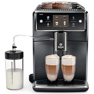 Saeco Xelsis Superautomatic with milk carafe and 2 glasses under its coffee spouts