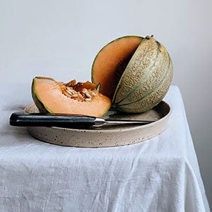 Melon on a tray as one of the best survival plants to grow 