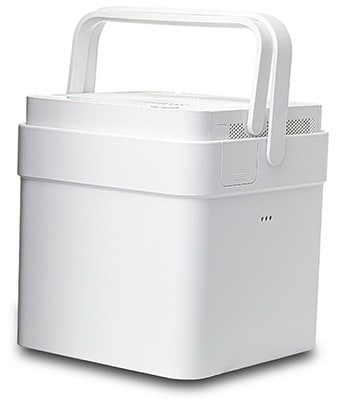 Midea 50 Pint Cube Dehumidifier with an all-white exterior and two handles 