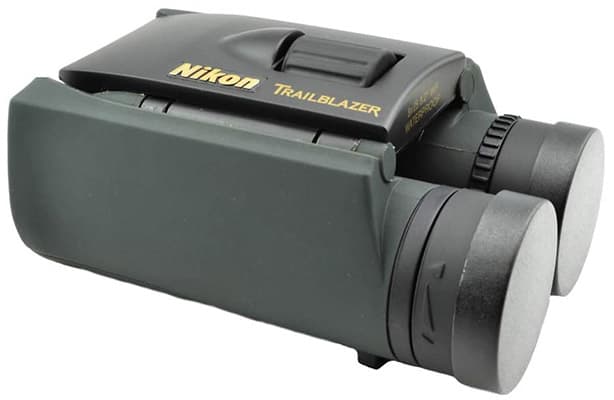 Nikon Trailblazer 8x25 with army green and black rubber body, covered lenses, and folded