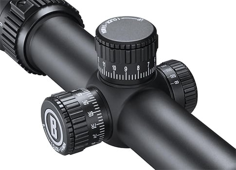 Bushnell riflescope in black matte, with dials on riflescope turrets