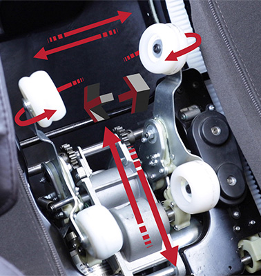 The inner workings of the Kyota M673 Kenko's massage rollers with red arrows pointing to the directions they travel