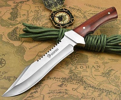 A map, compass, knotted rope, and NedFoss knife with grip edges on handle and a 7-inch blade with partial serration 